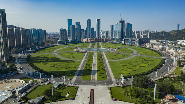 海口市与大连市哪个好