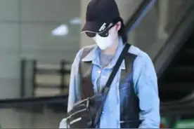 张馨予正式复出变高调！戴鸭舌帽穿皮夹克走机场，比军人老公还帅图片