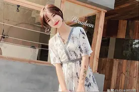 为何这款民族风沙滩裙这么好看？V领印花+拼接收腰，凸显淑女风味图片