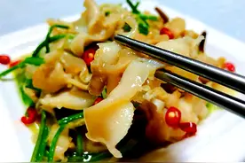 威海特色菜：油爆海螺和温拌海螺，鲜香海鲜风味，肉质脆嫩有韧性图片