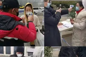设立安全检查站，发放宣传材料，外卖送餐只能在小区大门口处给居民递进来，为疫情防控的“金家岭效率”点赞图片