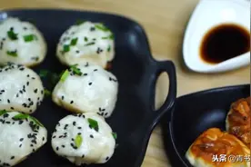 正宗上海生煎小笼包，外焦里嫩，鲜美多汁，咬一口满嘴汤汁超过瘾图片