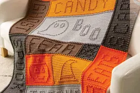 浮雕式字母图案拼色毛毯，休闲小盖毯，精致漂亮，时尚大方图片