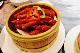 在广州吃饭一定会做的这个动作，你知道是什么吗？图片
