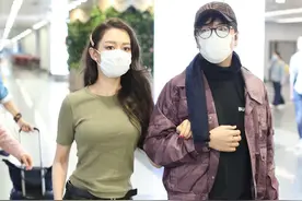 郎朗携混血小娇妻机场现身，眼神间流露着无限爱意图片