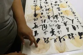 书画修复之清洗字画黄色对称污渍16处，修复前后反差大，非常成功