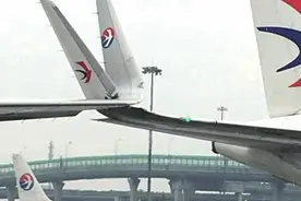 上海虹桥机场发生飞机机翼擦碰事故图片