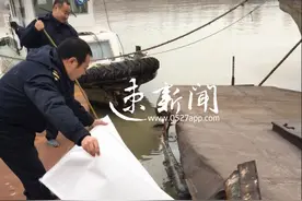 一艘拖船京杭运河搁浅溢油 幸处置及时 水质并无影响图片