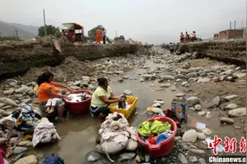 秘鲁洪水肆虐 首都生活用水告急图片
