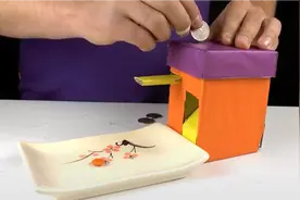 如何用纸板 制作一个M&M投币机？