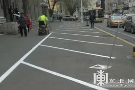 哈尔滨市违停严管街道路段新增252个免费公共停车泊位图片