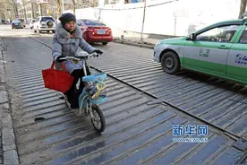 郑州现“搓衣板”路 骑车颠得屁股疼图片