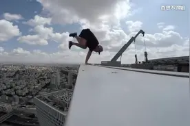 跑酷达人登上以色列特拉维夫500英尺高的摩天大楼视频封面