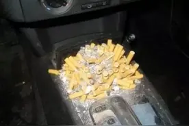 你们是不是也把车内的烟灰缸当储物格用了？图片