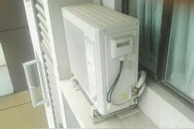 头悬邻居家空调外机 市民忧心：掉下来咋办？图片