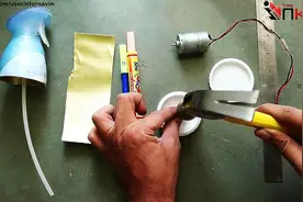 国外牛人用生活废品做了个小抽水泵，不错生活小技能，涨姿势了！图片