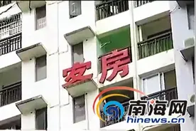 不能太任性！海口城管严查高楼违规悬挂招牌行为图片