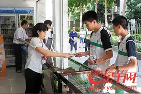 番禺率先“收编”学校小卖部 向“三无食品”说不图片