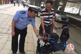 新式二维码电动自行车号牌亮相江城，车被盗会自动报警！图片