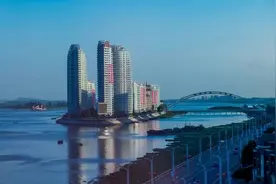 海岸线的弧度有始无终 我的梦四季如冬