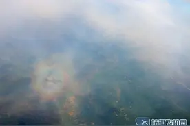 坐飞机沿途拍摄美丽风景 神奇佛光保佑飞机图片
