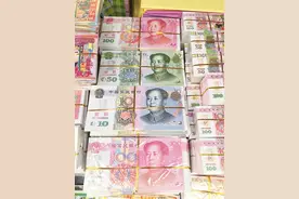 南宁街边惊现仿新版人民币冥币 市民质疑涉嫌违法图片
