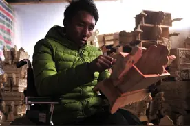 轮椅老板闯出的致富路图片