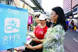 为方便中国游客消费 大马槟城商贩愿意接受支付宝图片
