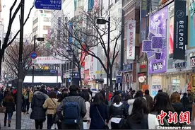 韩国提高购物即时退税消费额上限 方便外国游客图片