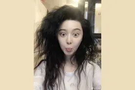 爆炸头也挡不住的美颜 范冰冰瞪眼嘟嘴搞怪十足图片