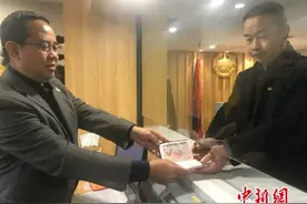 老挝驻长沙总领事馆开放业务办理 最快当天可取签证图片