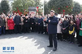 习近平春节前夕赴四川看望慰问各族干部群众图片
