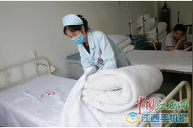 安远版石镇中心医院开展铺床技能比赛 迎接国际护士节图片