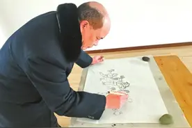 提笔是画家下地是农民 荣县农民用漫画反映农村生活图片