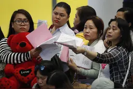 菲律宾禁止向科威特输出女佣 大量菲佣归国图片