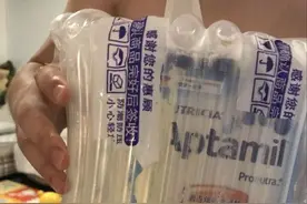 快递奶粉包装破裂 “保丢不保损”难题何解？图片
