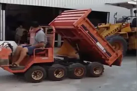 没有方向盘的卸货汽车如何操作？对老司机来说，那都不是事儿