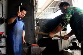 龙游打铁匠：孤独的守望图片