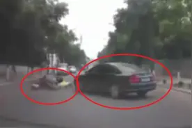 帕萨特不观察突然野蛮掉头  电动车美女惨被撞飞 头部重重落地图片