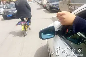 开车注意啦，抽烟也会被罚图片