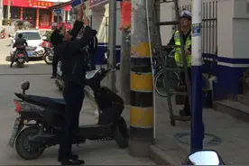 汉滨交警：完善交通标牌标线 保障学生出行安全图片