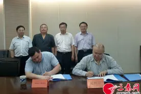 虎标公司与俄企签约 以后喝俄罗斯椴树蜜更方便图片