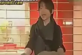 刘谦在日本街头表演穿墙魔术 当场吓倒一片妹妹!图片