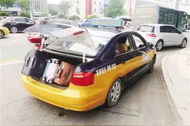 后备厢不盖好上路属违法行为吗？图片