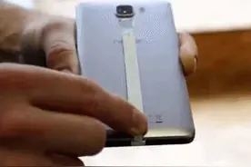 给iPhone贴个纸片，就能无线充电！好神奇啊！图片