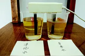 销售商用“电解水”实验促销净水器 自来水变黑绿色图片