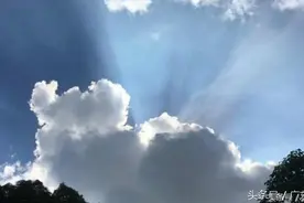 实拍深圳凤凰山上太阳遮云欲出 现“佛光普照”奇观图片