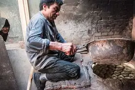 手与火的艺术：打馕人的斋月影记图片