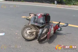 摩托车电瓶车相撞 两人重伤入院图片