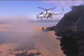 俄米35M直升机发射反坦克导弹，感觉机身都差不多烧起来了